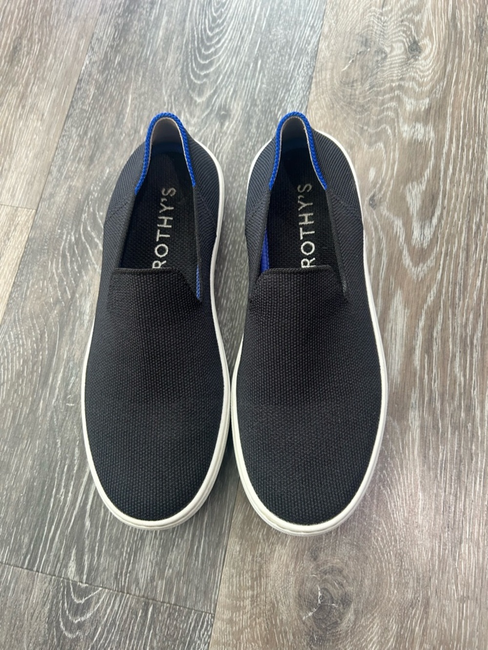 Rothy's Black Slip-On Loafers with Blue Trim